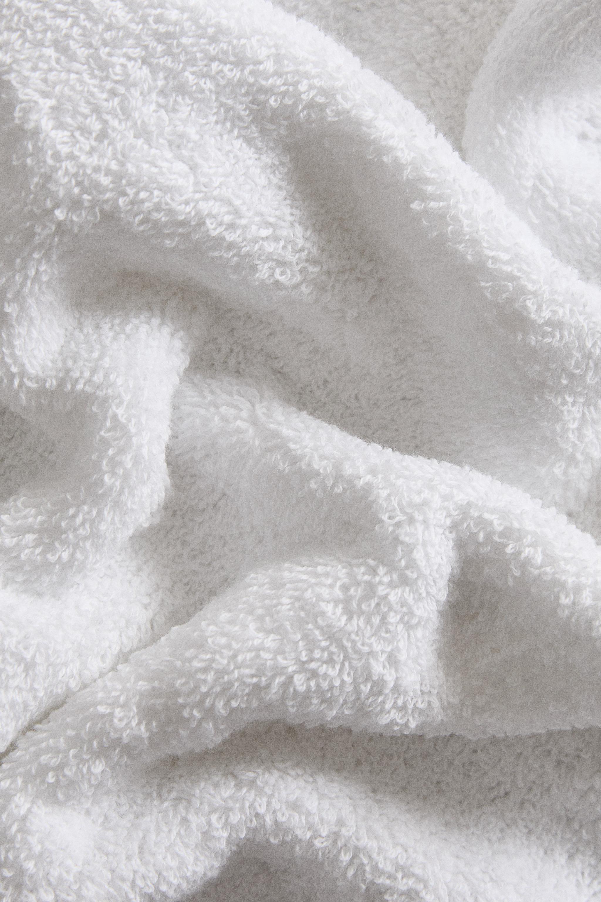 BATH TOWEL WITH PIQUÉ BAND